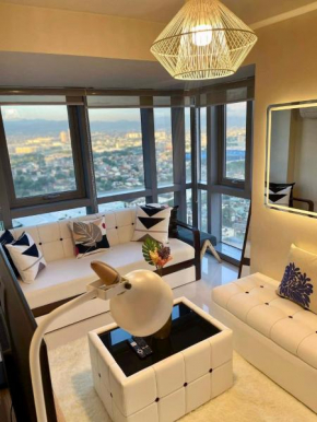 Classy 2BR Suite at Eastwood City with Pool and City Skyline View